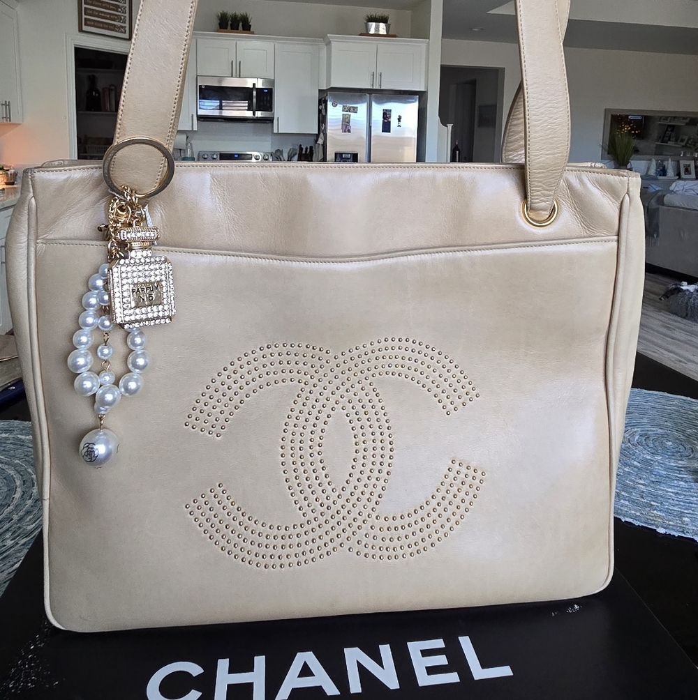 SOLD. CHANEL Beige Studded Tote Bag